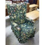 A vintage wing back chair for re-upholstery.