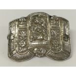 Asian silver/white metal buckle decorated with sea creatures and flowers. Weight approx 18g - no