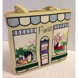 A Lulu Guiness designer handbag with 'Florist Shop' design. Some slight signs of wear.