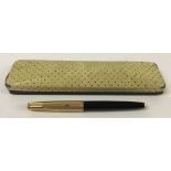 A Parker 61 capillary action fountain pen in black with gold cap.