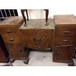 A mid 20th century sideboard with walnut veneer.