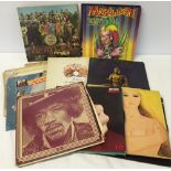 A box of vintage LP records to include the Beatles, Queen, Elton John, Cat Stevens, etc.