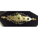 Antique gold brooch set with blue, white and red stones.  Tests as 12ct gold, approx weight 5.1g