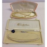 2 boxed sets of faux pearls, one by Rosita in champagne finish, the other by Elizabethan Pearls.