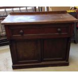 A Victorian secretaire with cupboard below.