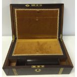 A mahogany writing slope with restored tan velvet interior, brass edges, banding and vacant