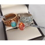 3 silver rings set with coloured stones to include blue topaz, mystic topaz and boulder opal. One