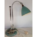 A vintage Bestlite adjustable lamp with pale blue base and shade