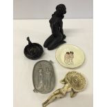 5 risque items to include 2 ashtrays, a dish and 2 figures.