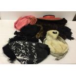 A collection of quality vintage clothing to include a mink stole in very good condition, a mink wrap