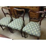 3 Victorian balloon back chairs with blue upholstery and carved legs.
