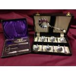 An EPNS boxed set of fruit spoons with a part boxed manicure set.