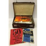 A small case containing sheet music books