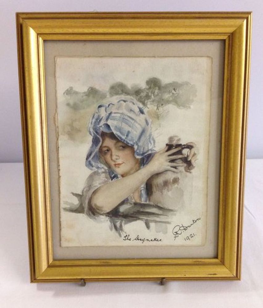 A framed & glazed watercolour 'The Haymaker' signed R Dunton 1921.  Frame size 30cm x 25cm.