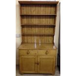 Victorian honey pine dresser. 2 doors & 2 drawers.