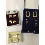 10 pairs of earrings to include 9ct gold hoops, studs, horses heads and enamel butterfly.