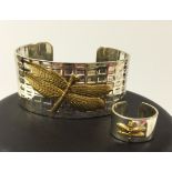 A 925 silver bangle and ring with raised gilt dragonfly decoration.