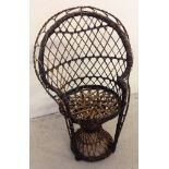 A miniature cane colonial style armchair - 32cm tall