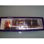 A LionToys 1:50 scale limited edition articulated lorry with timber load in red livery. VG in G box