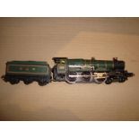 A Wrenn OO Gauge loco in GWR green livery numbered 7002, named Devizes Castle. F-G