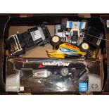 A group of radio control cars and controllers as lotted.  F-G (unboxed) (Q)