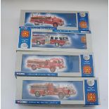 A group of Corgi American style fire engines. E in G-VG boxes (4)