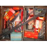 Two large trays containing a large selection of Hornby and Tri-Ang track, accessories and