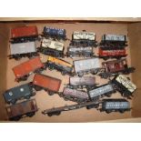 A tray of mostly proprietary wagons by Bachmann, Hornby etc.  Most have been weathered and fitted