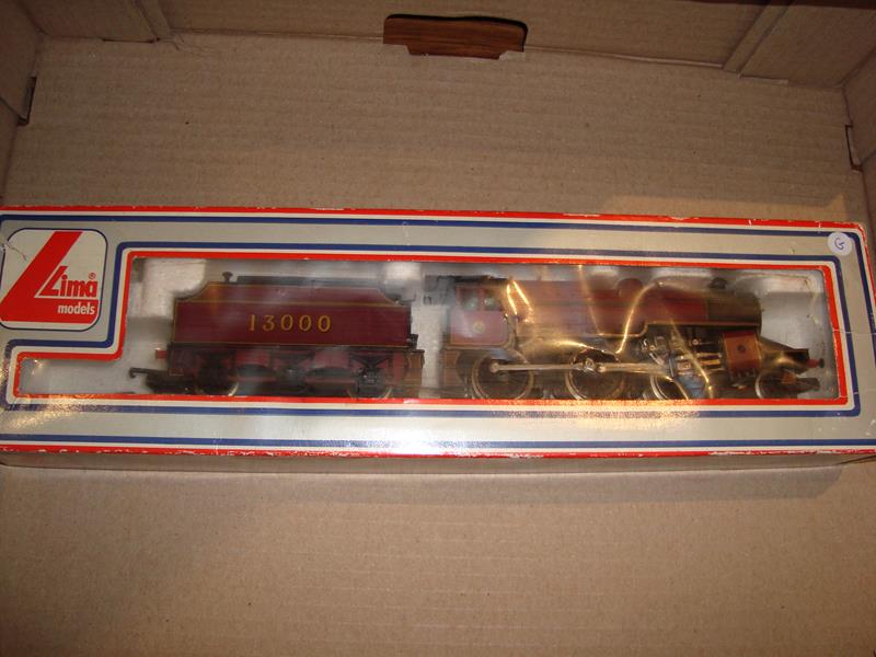 A Lima OO Gauge 2-6-0 Crab locomotive in LMS livery. F-G in a G box.