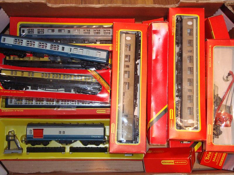 A collection of mostly boxed Hornby rolling stock to include carriages and wagons.  G-VG in F-G