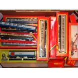 A collection of mostly boxed Hornby rolling stock to include carriages and wagons.  G-VG in F-G