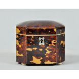 A George III tortoiseshell tea caddy of small proportion, being of octagonal form with a domed