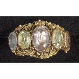 A yellow metal five stone kunzite set ring.