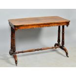 A mid Victorian rosewood table of rectangular form with rounded corners and shallow frieze, with
