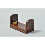 A 19c walnut self closing mini prayer book slide, with hinged folding ends, 4.5" closed.