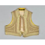 A 19c ottoman gold wire and coral bead waistcoat.