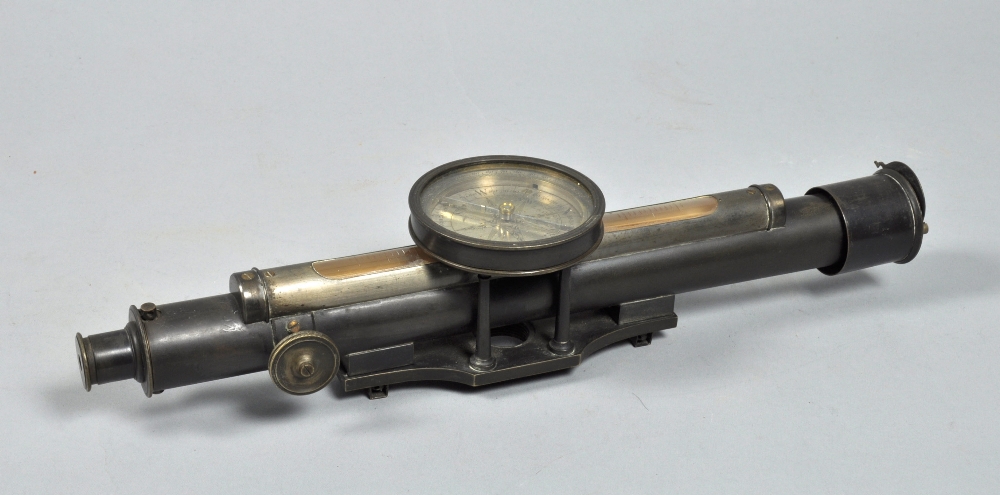 A late 19c theodolite by Troughton & Simms with bronze finished telescope with rack and pinion