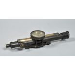A late 19c theodolite by Troughton & Simms with bronze finished telescope with rack and pinion