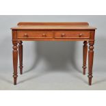 A Victorian mahogany side table of rectangular form with moulded edge, fitted two short drawers