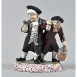An early 19c pearlware figure group 'The Parson & The Clerk', 8.75"h.