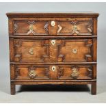 A late 17c oak geometric three drawer chest on stile legs, 38"w, 35"h.