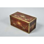 An early 19c mahogany two compartment tea caddy with mixing bowl recess and being of rectangular