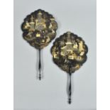 A pair of 19c Oriental black lacquered hand fans , gilt decorated leaves with mother of pearl