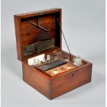 A late Georgian mahogany apothecary's box, fitted with a cylindrical brass cased heater lamp, a