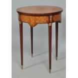 A 19c Louis XV style harewood circular table ambulant, the top with a diamond parquetry panel within