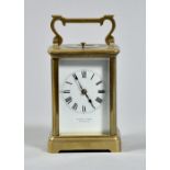 A late 19c French carriage clock marked 'R & Co, Paris' and having a striking and hour repeating