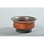 A Tibetan tsampa - ceremonial bowl of turned wood and metal case construction, 4"diam.