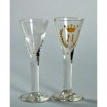 Two early 19c wine glasses with trumpet bowls, both engraved with a crowned N, one gilded, on