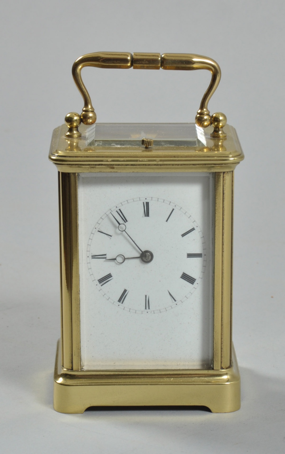 An early 20c French carriage clock striking and hour repeating on a bell. The movement has a