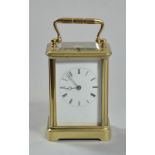 An early 20c French carriage clock striking and hour repeating on a bell. The movement has a